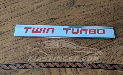 red twin turbo badge
