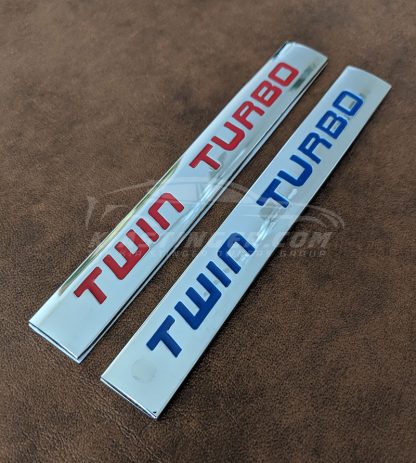 twin turbo badge in red and blue