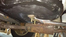 bolts under tire well.webp